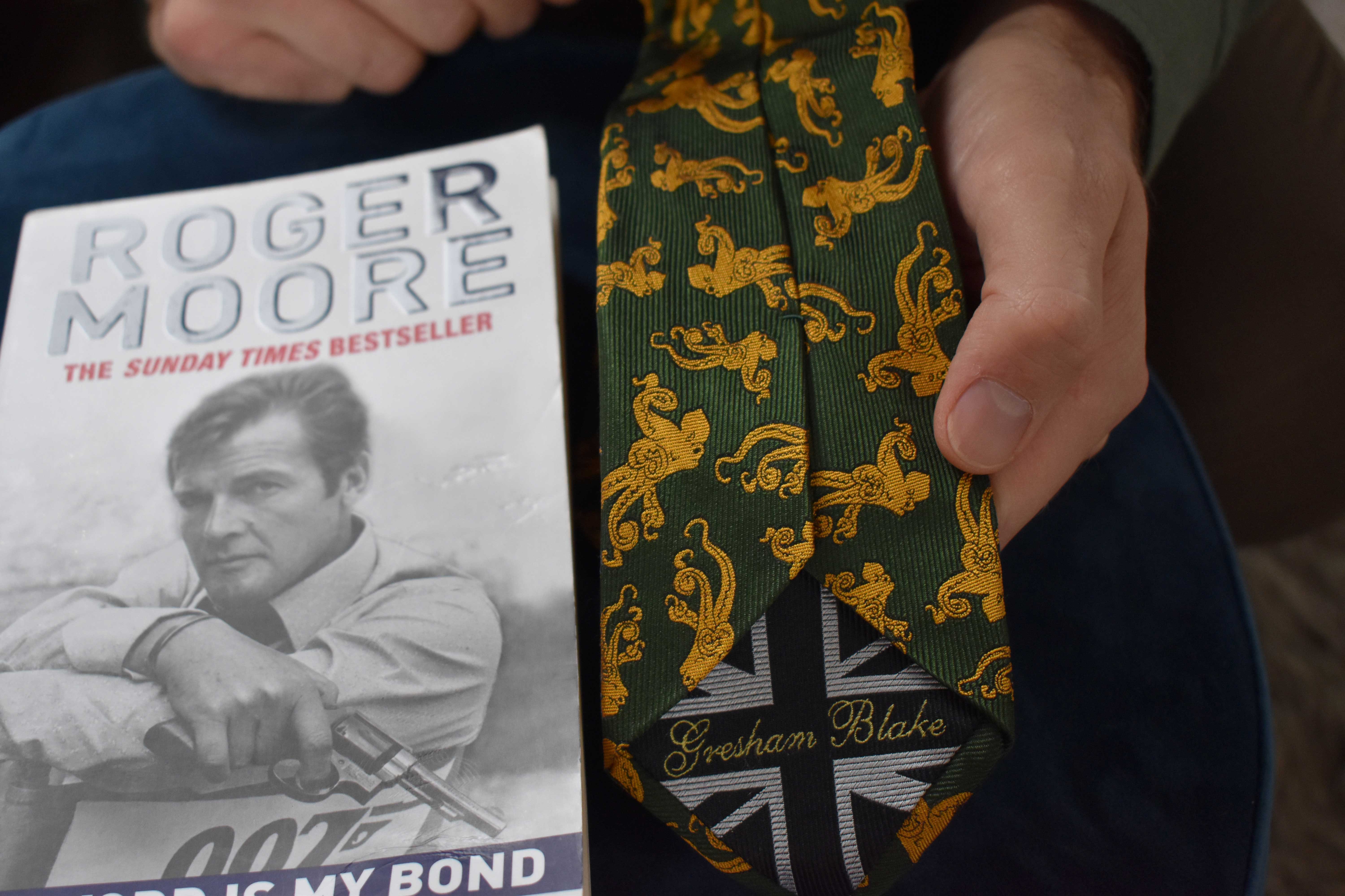 roger moore book and octopussy tie