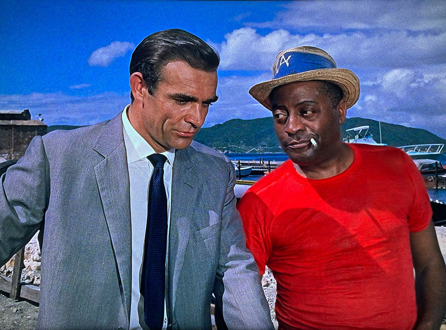 Dr No (1962) Bond wearing a suit and grenadine tie