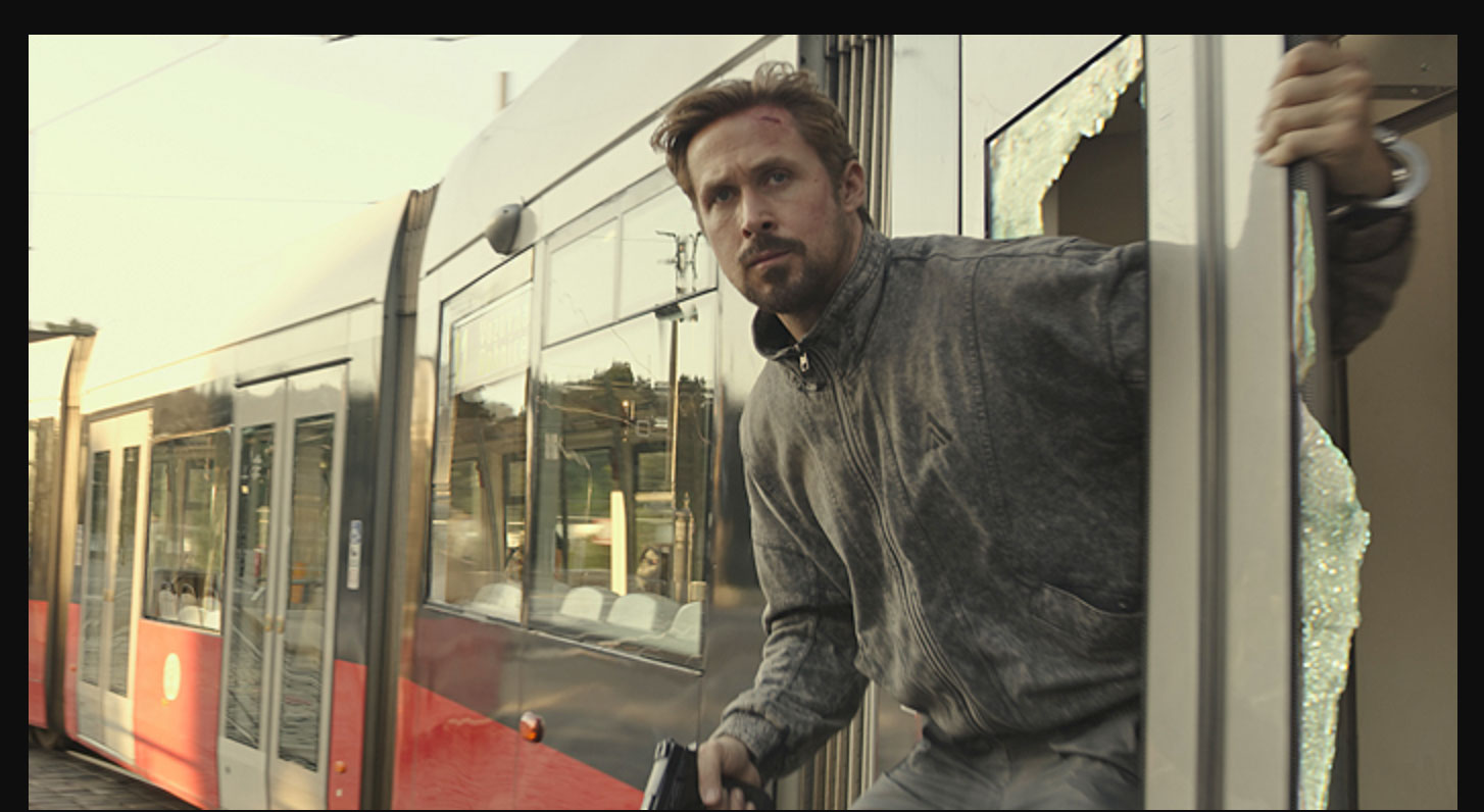 The Gray Man gosling jacket on a train