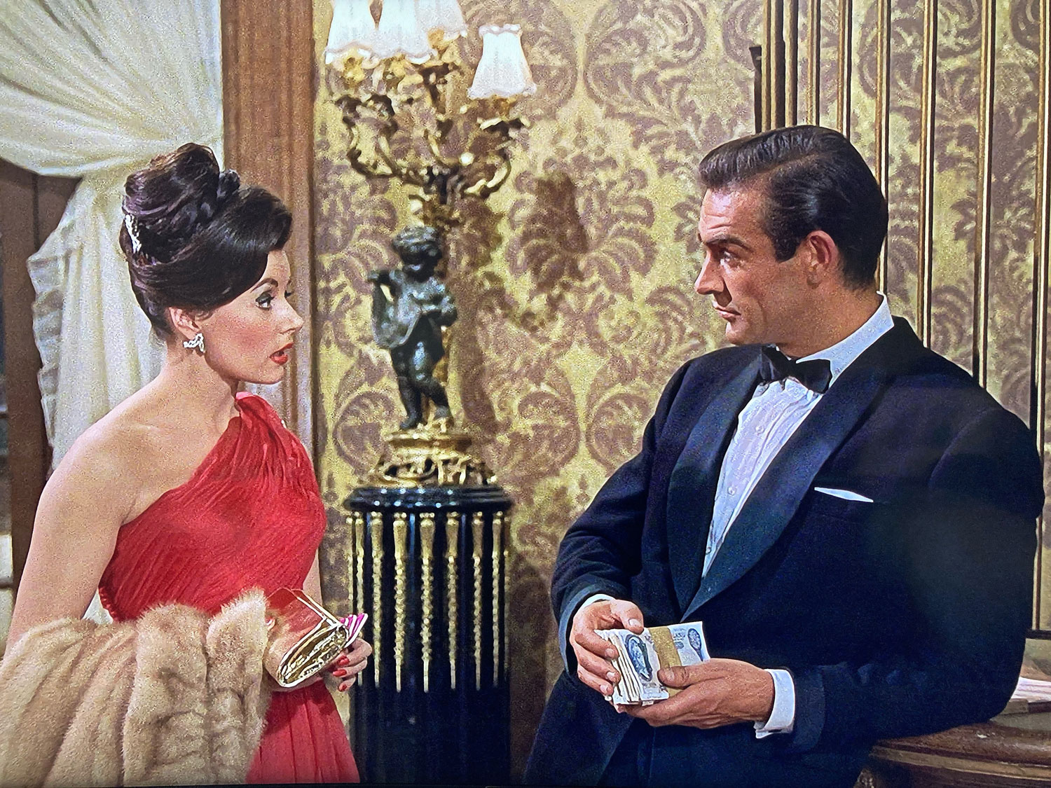 Anthony Sinclair tuxedo Connery in Dr No talking to Eunice Grayson